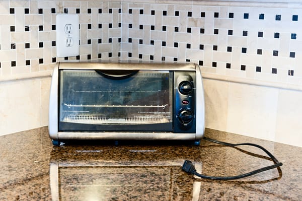 unplugged toaster oven on a kitchen counter