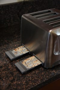 toaster with crumb tray pulled out