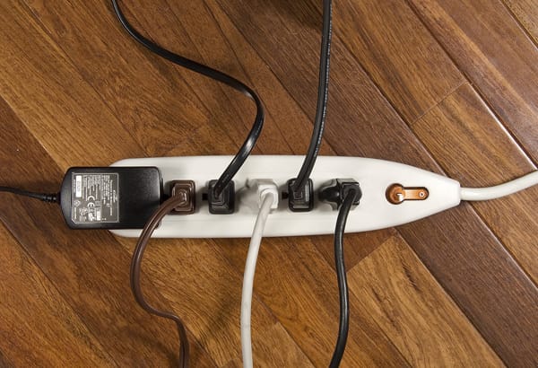 overloaded power strip with all outlets used