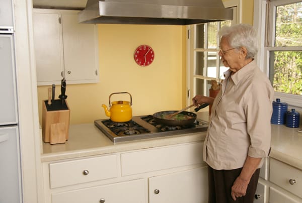 older woman cooking