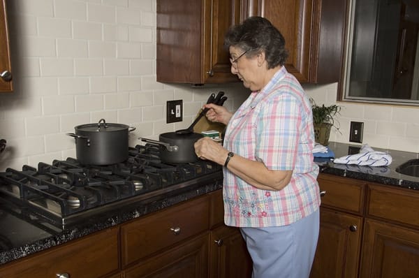 older woman cooking