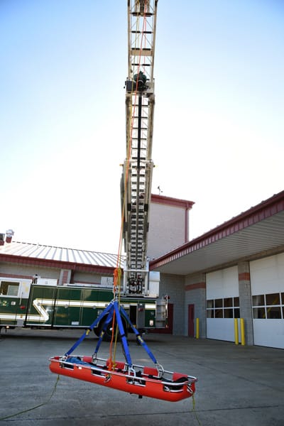 ladder truck lowering stretcher