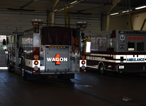 ambulance and engine in fire station