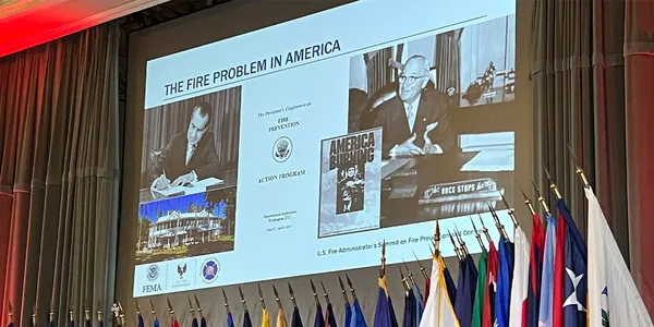 A State of Science presentation slide showing Presidents Nixon and Truman, along with a cover of the America Burning report.