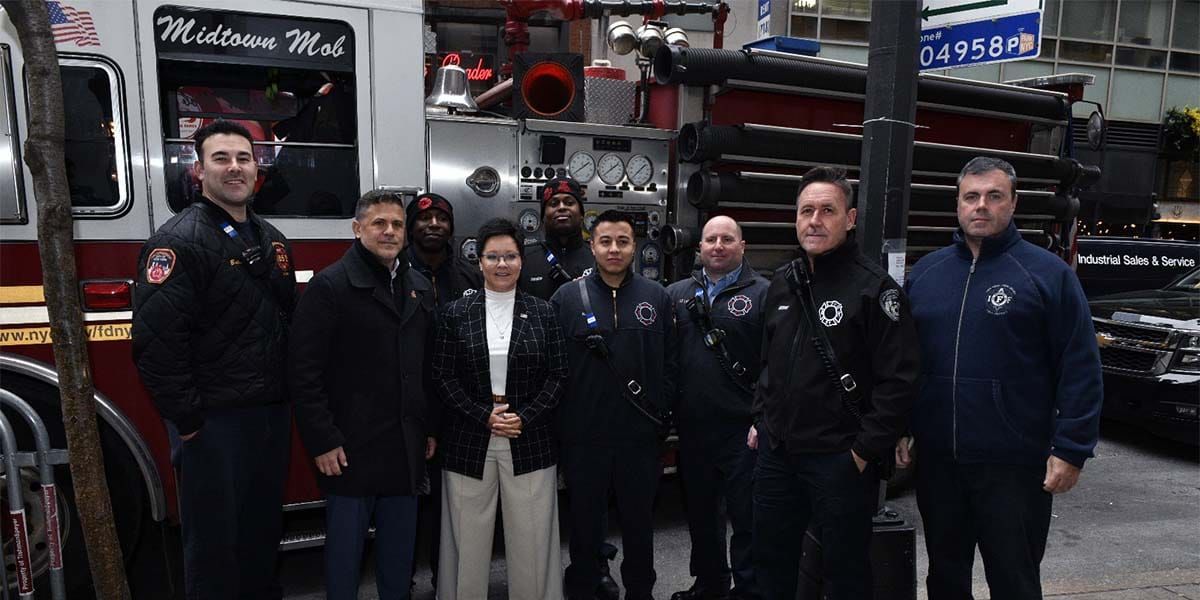 Dr. Lori Moore-Merrell and members of FDNY 65, the Midtown Mob, after today's press event in New York City.