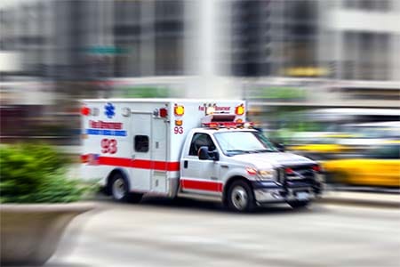 photo of a blurred ambulance