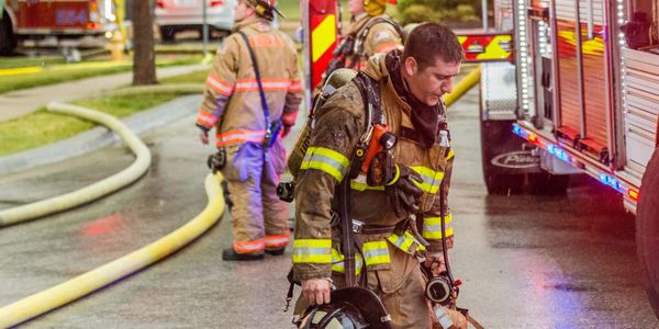 Photo of a firefighter showing fatigue