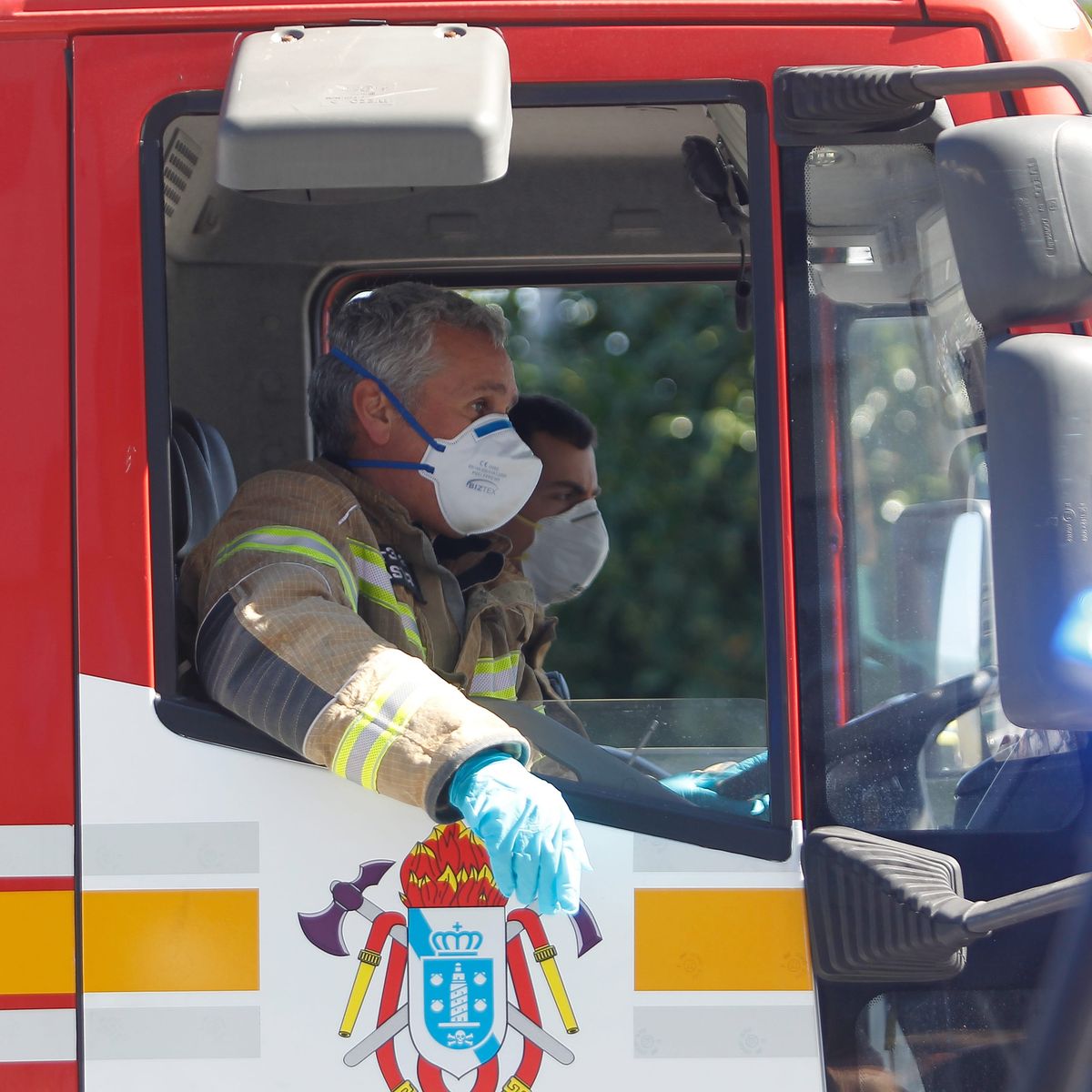 Photo of firefighters in a fire truck