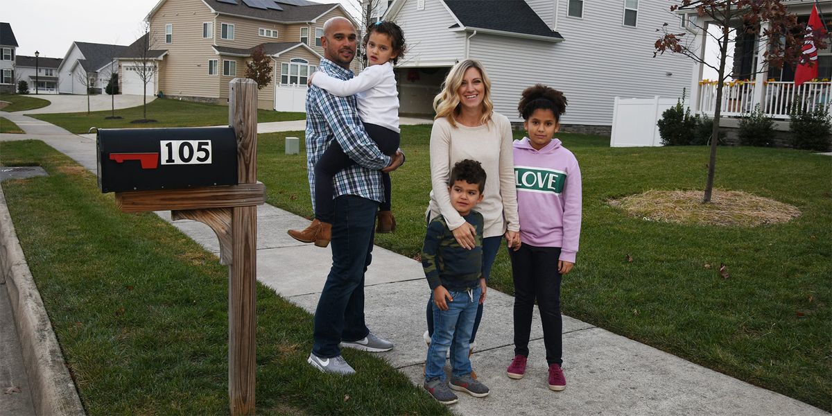 Photo of a family at their meeting place