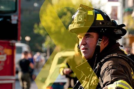 yellow ribbon overlaid on a photo of a firefighter looking in to the distance