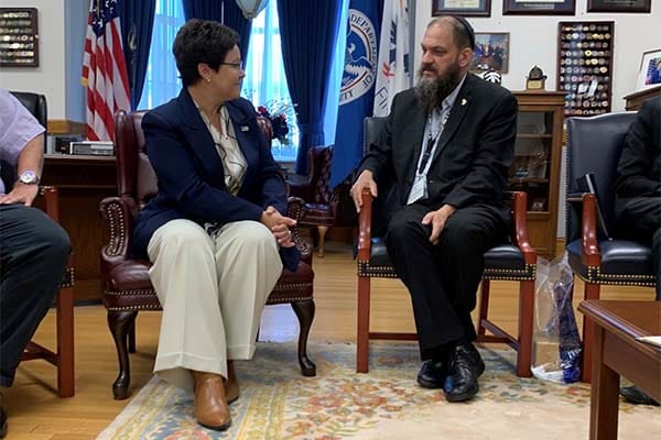 Dr. Lori Moore-Merrell speaks with an Israeli mayor