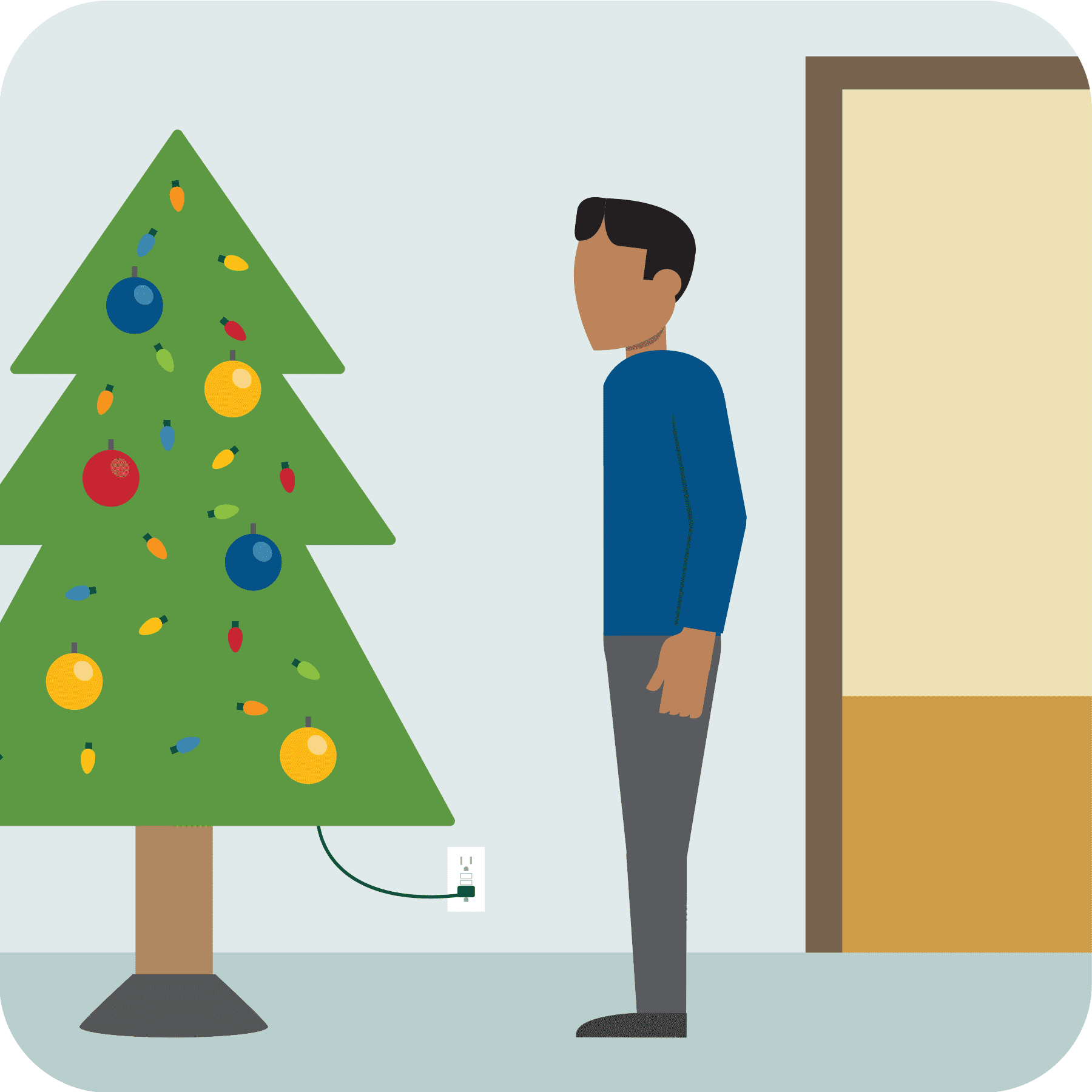 Man standing beside a lit Christmas tree.